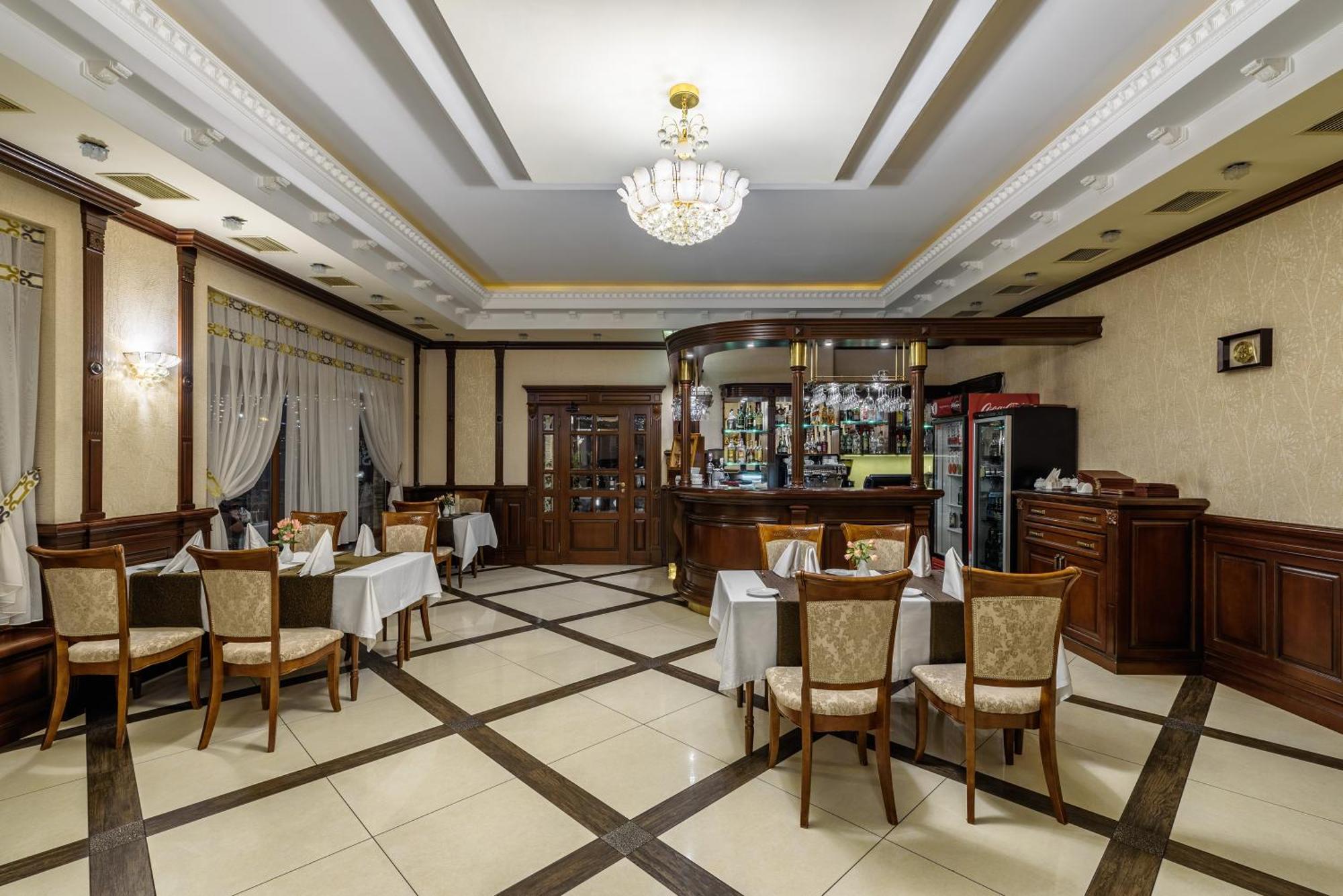 Status Hotel Malehiv Kültér fotó